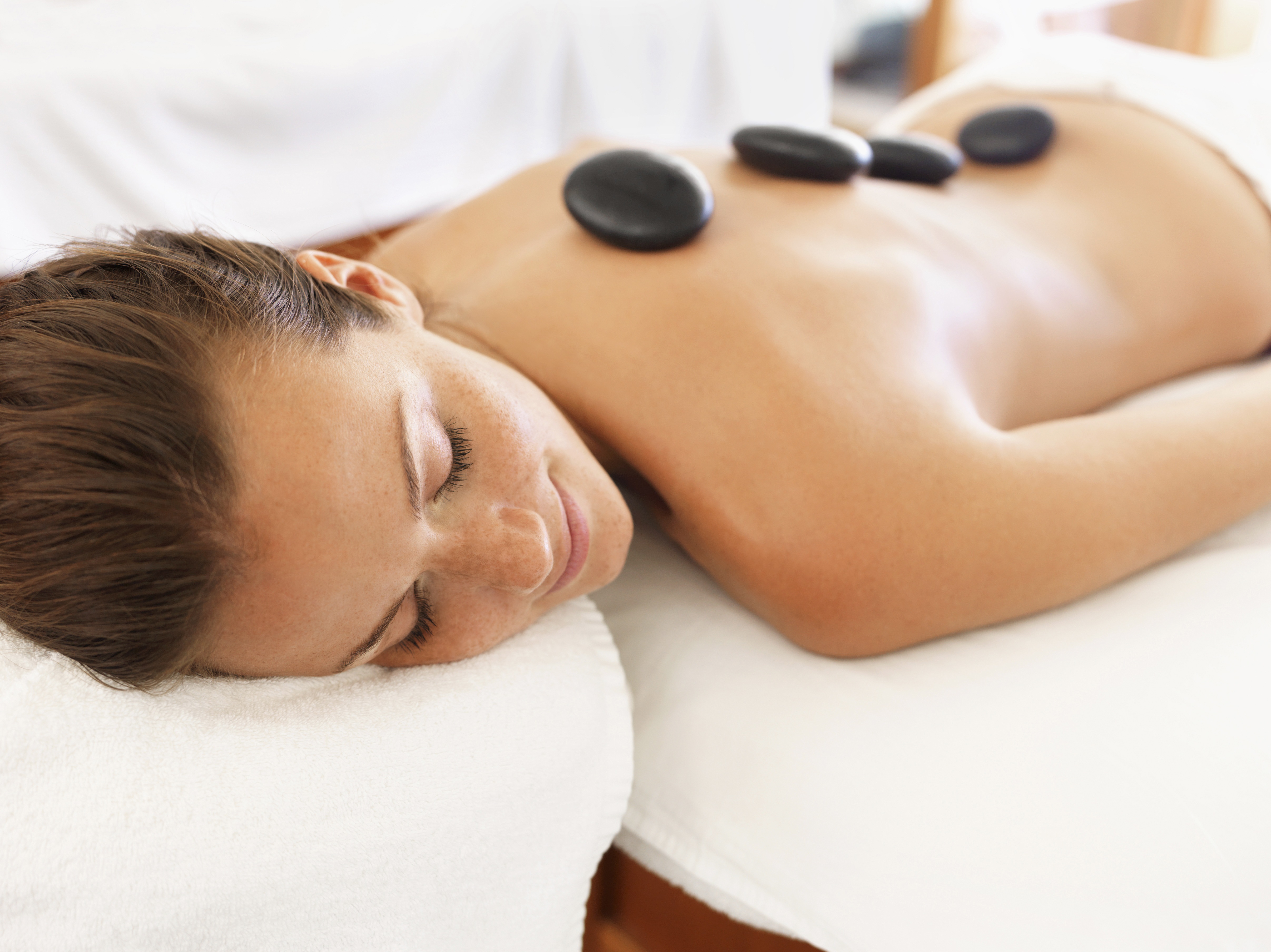 Hot stone massage at Vibrant Living Day Spa